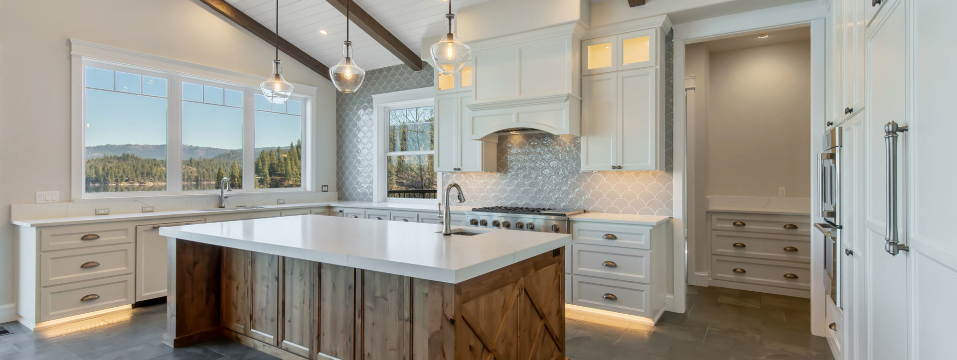 Custom interior wood finishing and staining for high-end cabinetry and trim